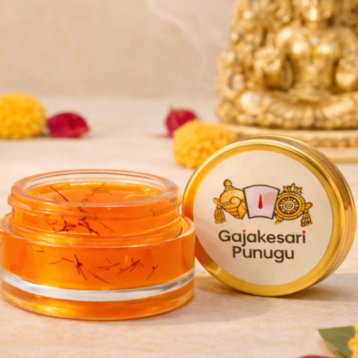Gajakesari Punugu container styled with maroon silk and jasmine buds